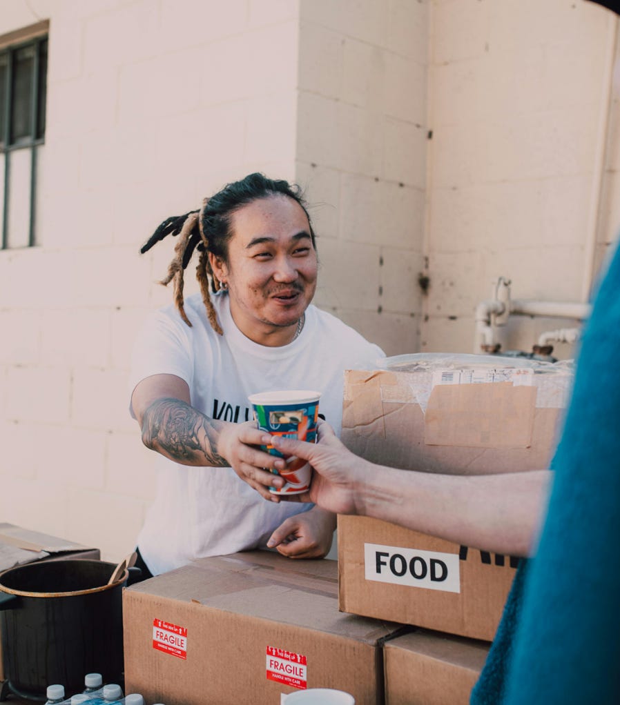 A Man Donating a Good