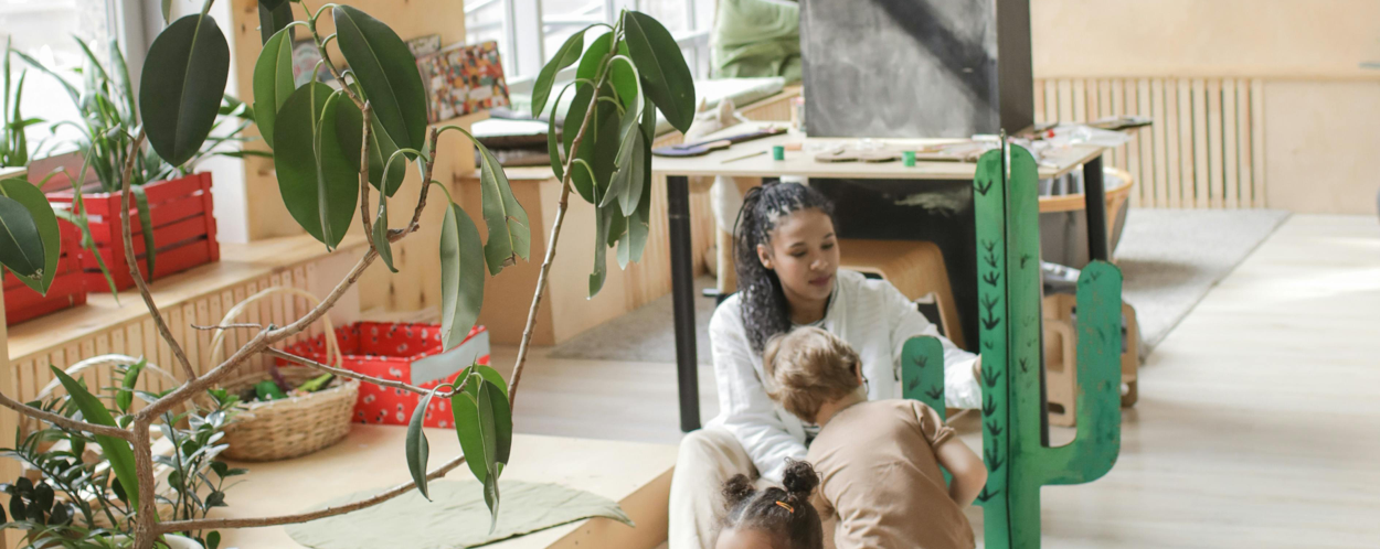 Children Doing Arts and Crafts in with their Teacher in a Classroom